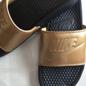 Gold nike slides